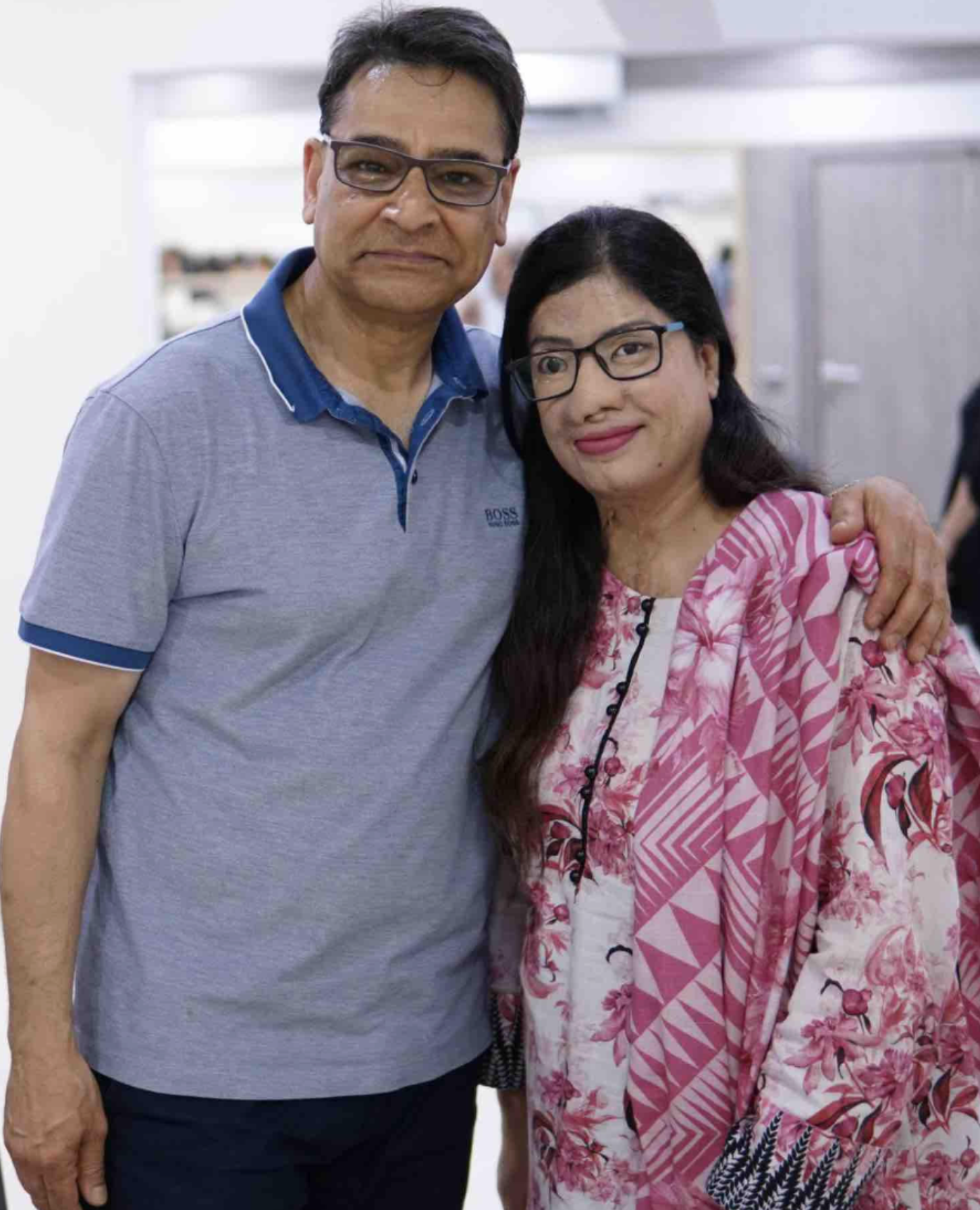 Thumbnail for post: Crown Clinic’s Dr Asim Shahmalak reunited with woman attacked by acid whose faces he helped to rebuild
